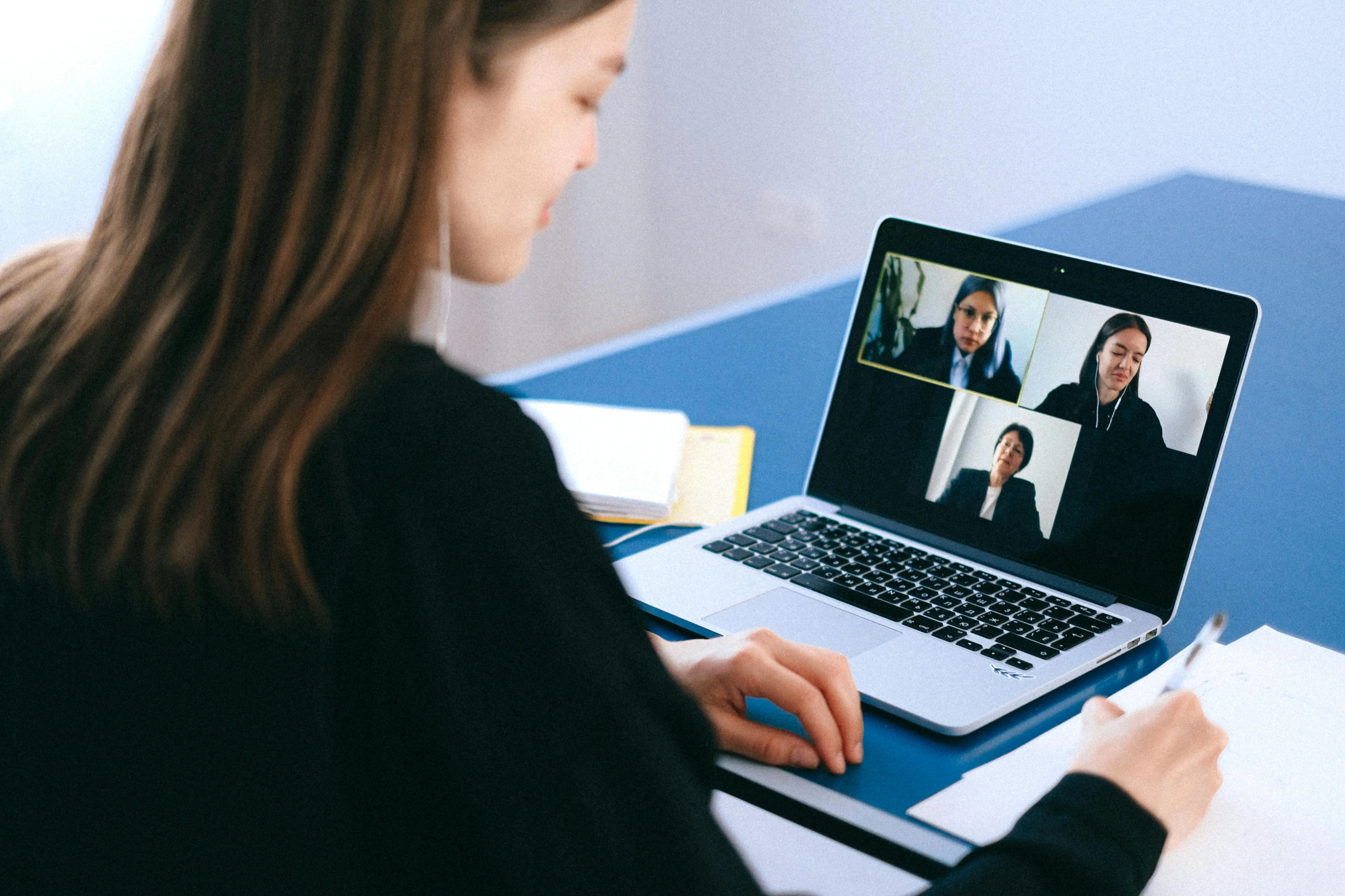 Image showing several people having a work video conference.